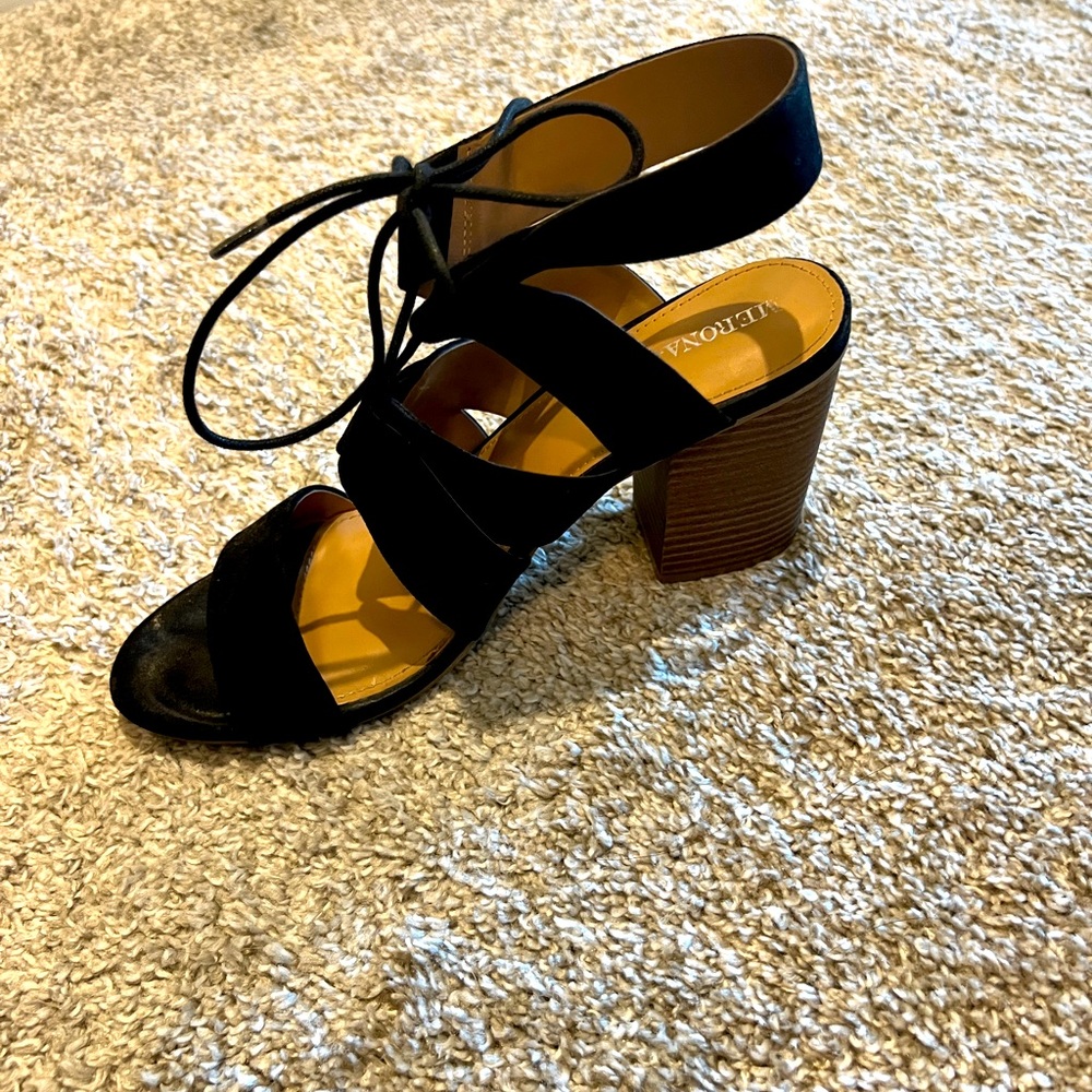 Laced up thick heel black shoe